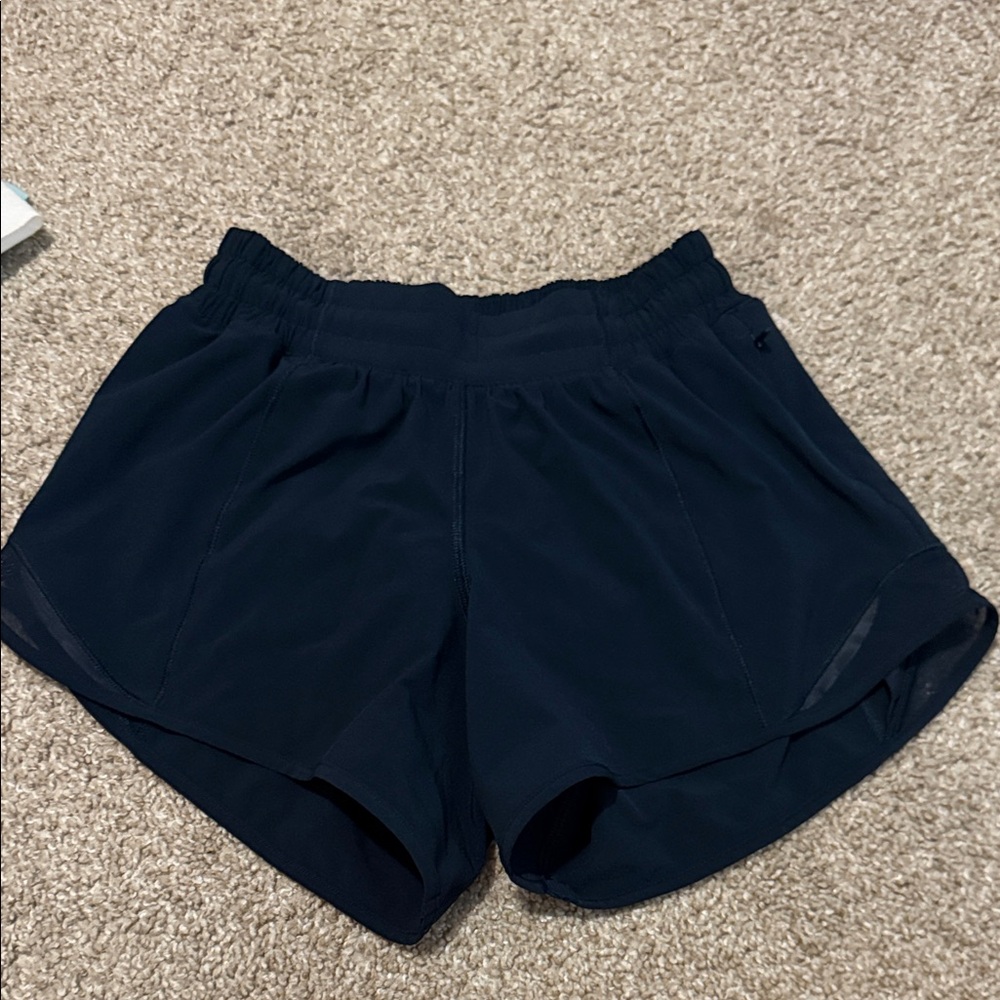 Lululemon Women's navy hotty hot Shorts 2 inches and size 2. Barely worn